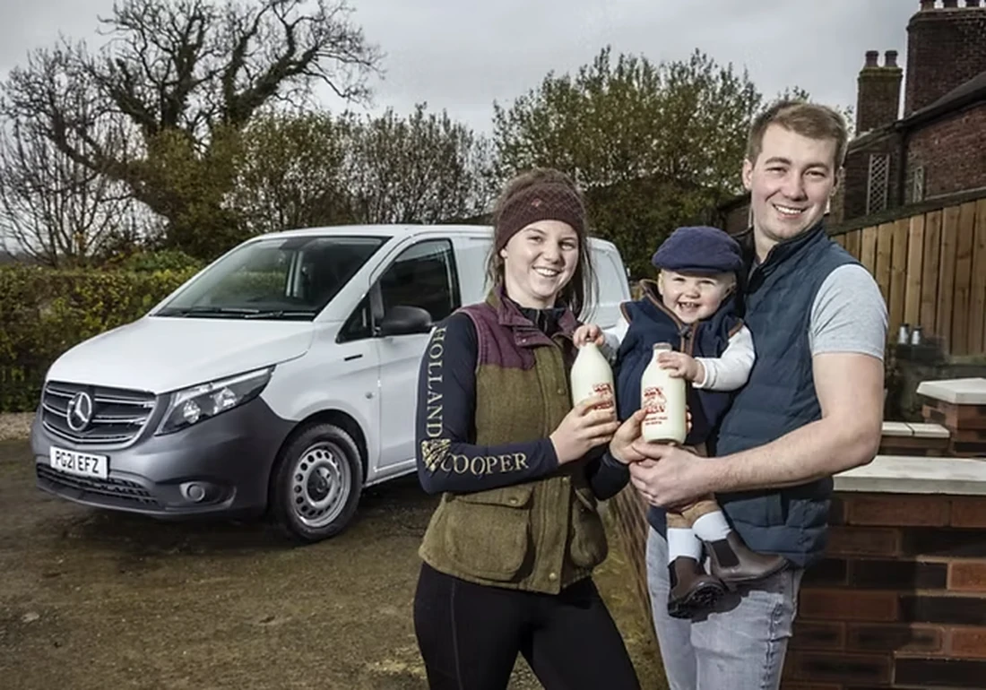 Annie and John beside the Fiddlers milk delivery van